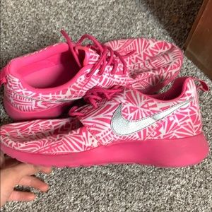 Pink Nike running shoes